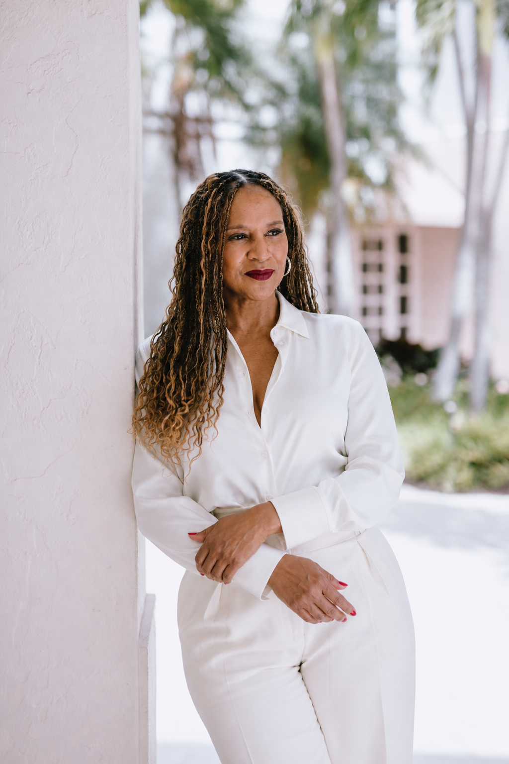 AI brand image of a client in a white silk shirt outdoors